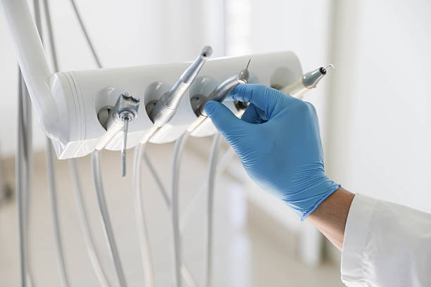 Professional Tooth Extraction technician working in LaCoste, TX